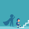 A boy going up some stairs to his goal while his shadow shows he's a superhero in a cape