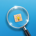 A magnifying glass over a tile with a light bulb on it