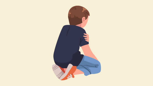 A child who is sitting nervously